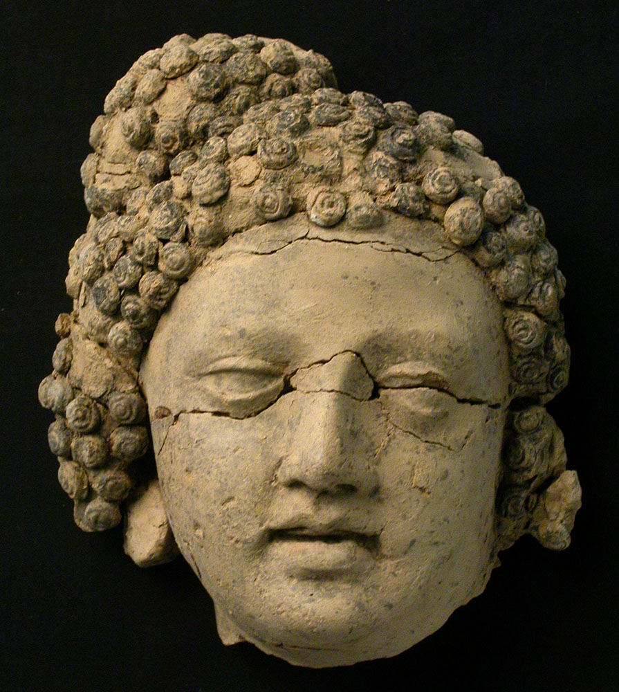 10 Head_of_deva_from_niche_76_with_traces_of_red_paint_on_the_eyebrows_and_black_paint_in_the_hair_ _ts_1871