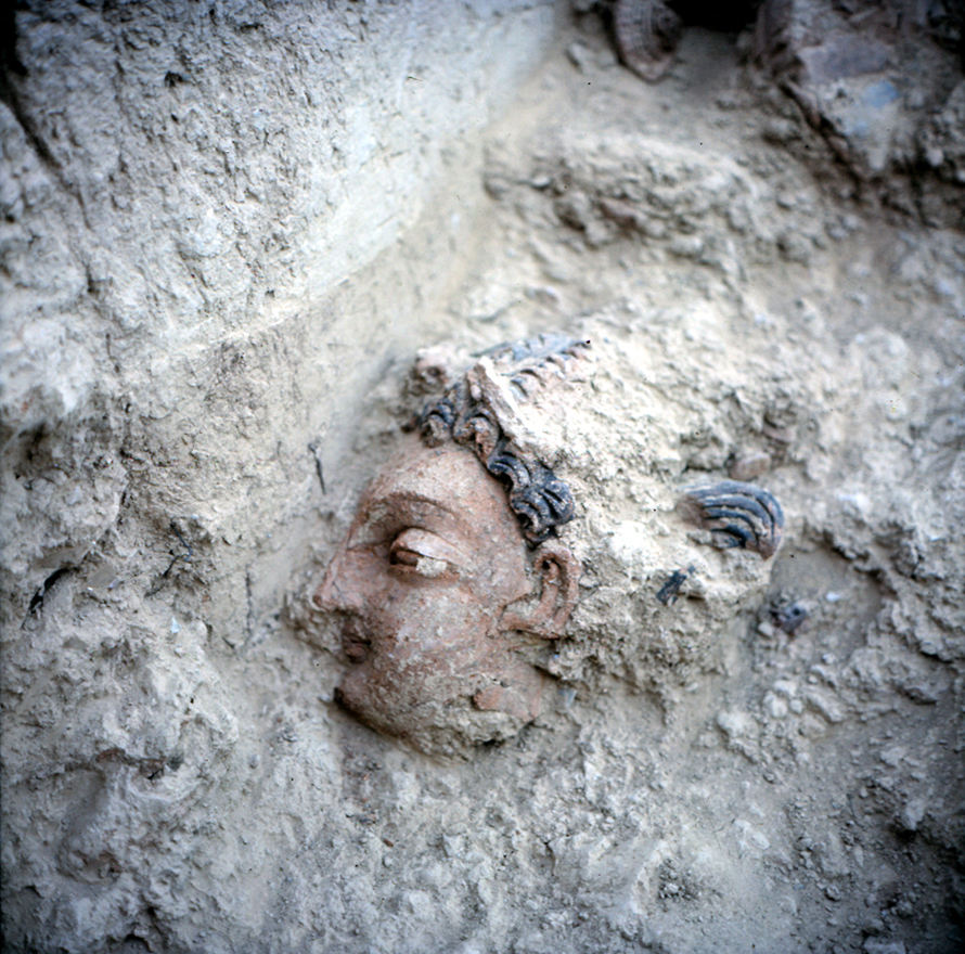 11 Excavation_of_a_bodhisattva_head_still_preserving_the_original_painting